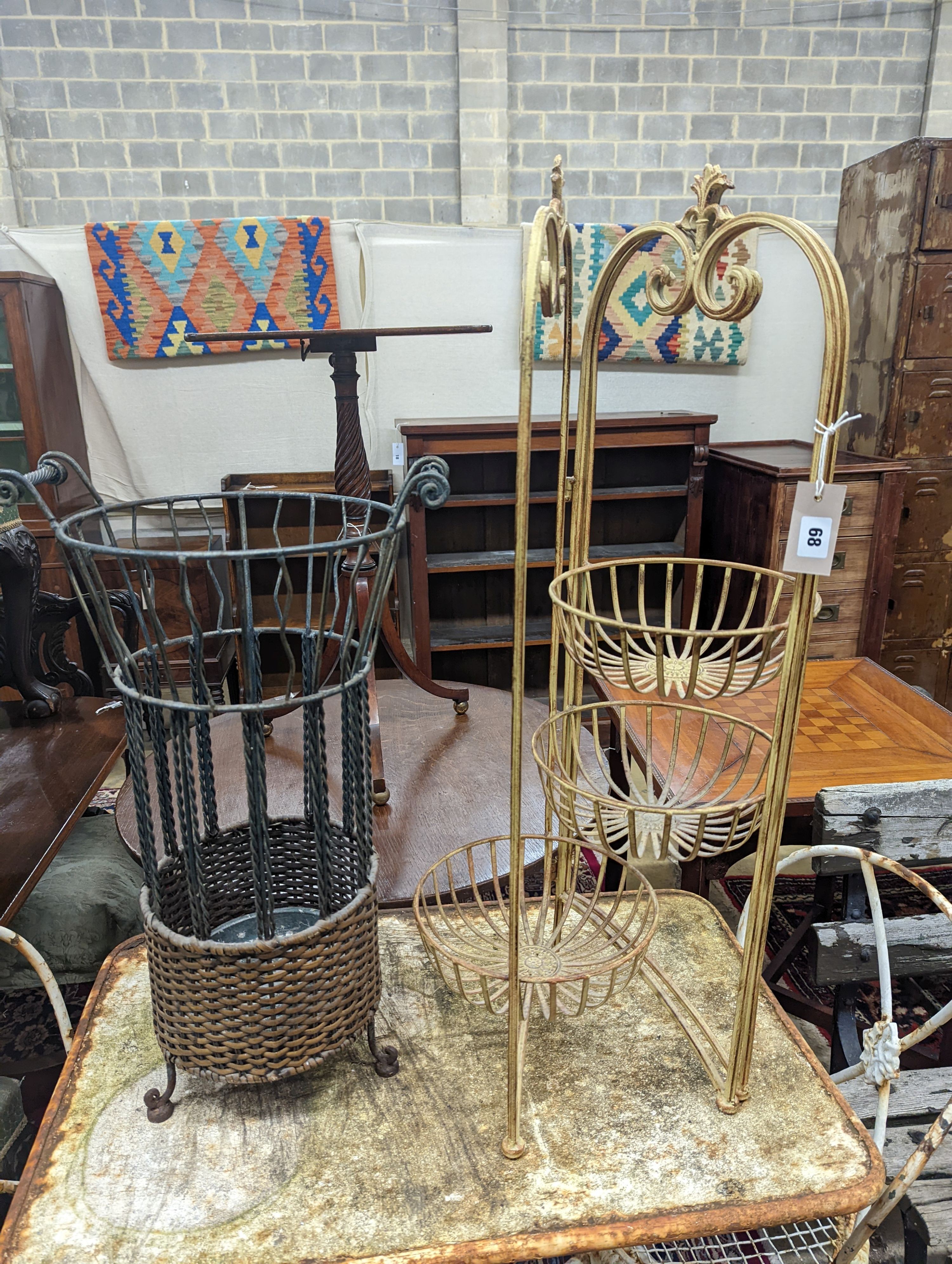 A rattan and wirework stick stand, height 63cm, together with one other folding stand